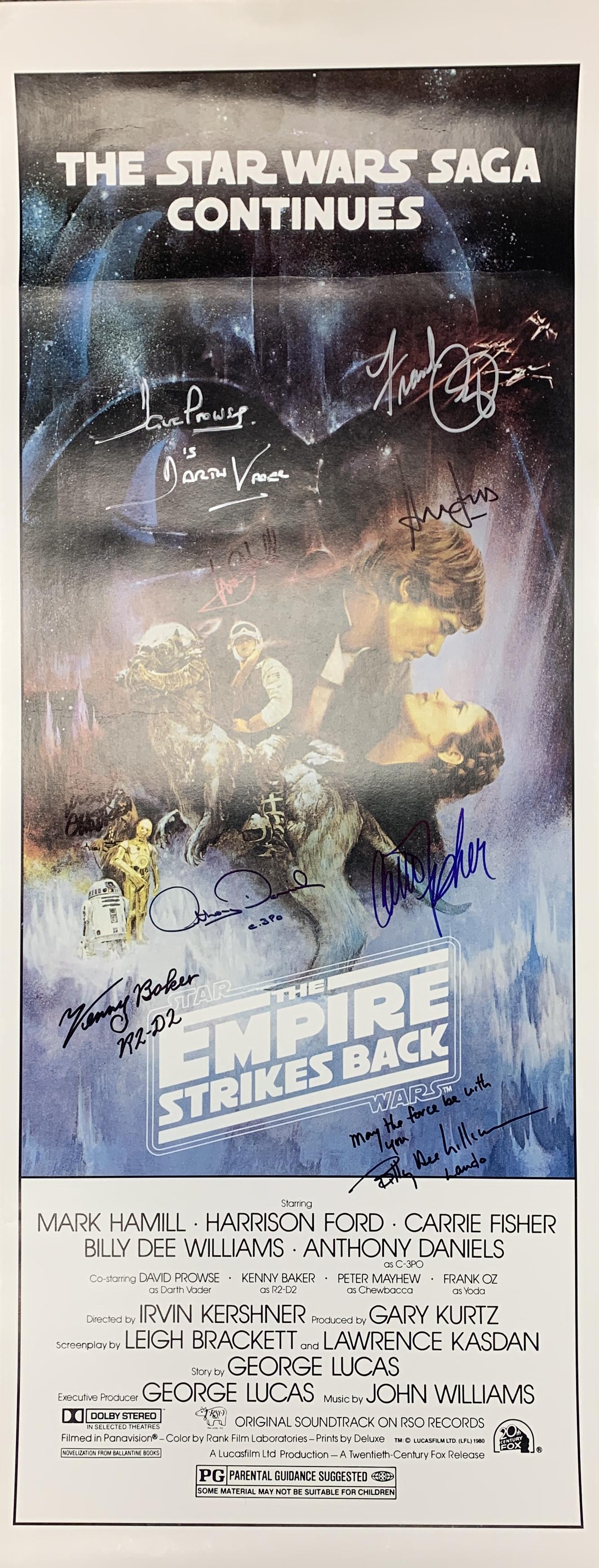 Star Wars Empire Strikes Back cast signed original: Star Wars Empire Strikes Back cast signed original insert poster autographed by Mark Hamill, Carrie Fisher, Harrison Ford, Frank Oz, Dave Prowse, Peter Mayhew, Kenny Baker, Billy Dee Williams and Anth