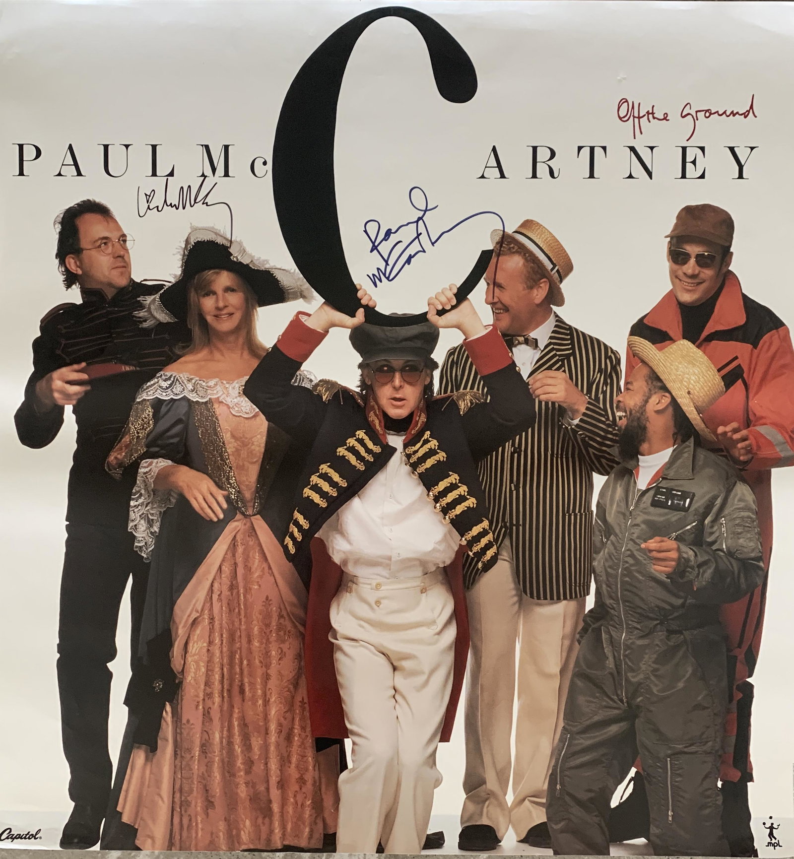 Paul McCartney Off The Ground signed poster: Paul McCartney Off The Ground signed poster autographed by Paul McCartney and Linda McCartney. 24x24 Inches