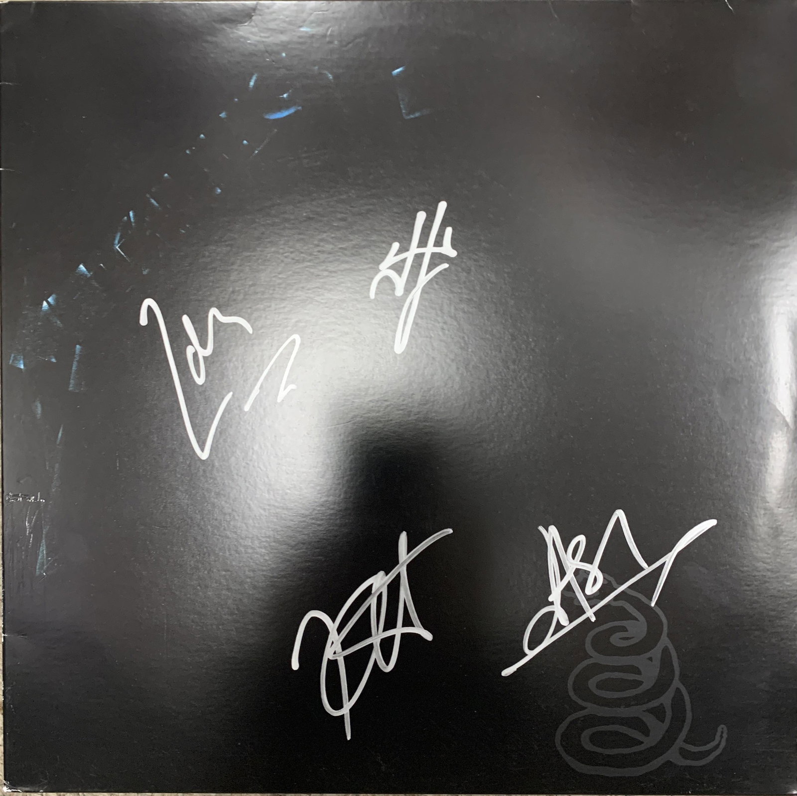 Metallica Black signed album: Metallica Black signed album autographed by James Hetfield, Lars Ulrich, Kirk Hammett and Jason Newsted. 12x12 inches