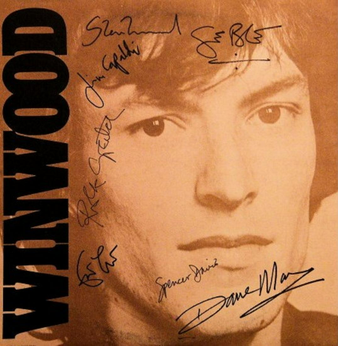 Steve Winwood signed debut album "Winwood": Steve Winwood 1972 debut album "Winwood" autographed by Steve Winwood, Eric Clapton, Ginger Baker, Jim Capaldi, Spencer Davis, Rick Gretch, and Dave Mason.