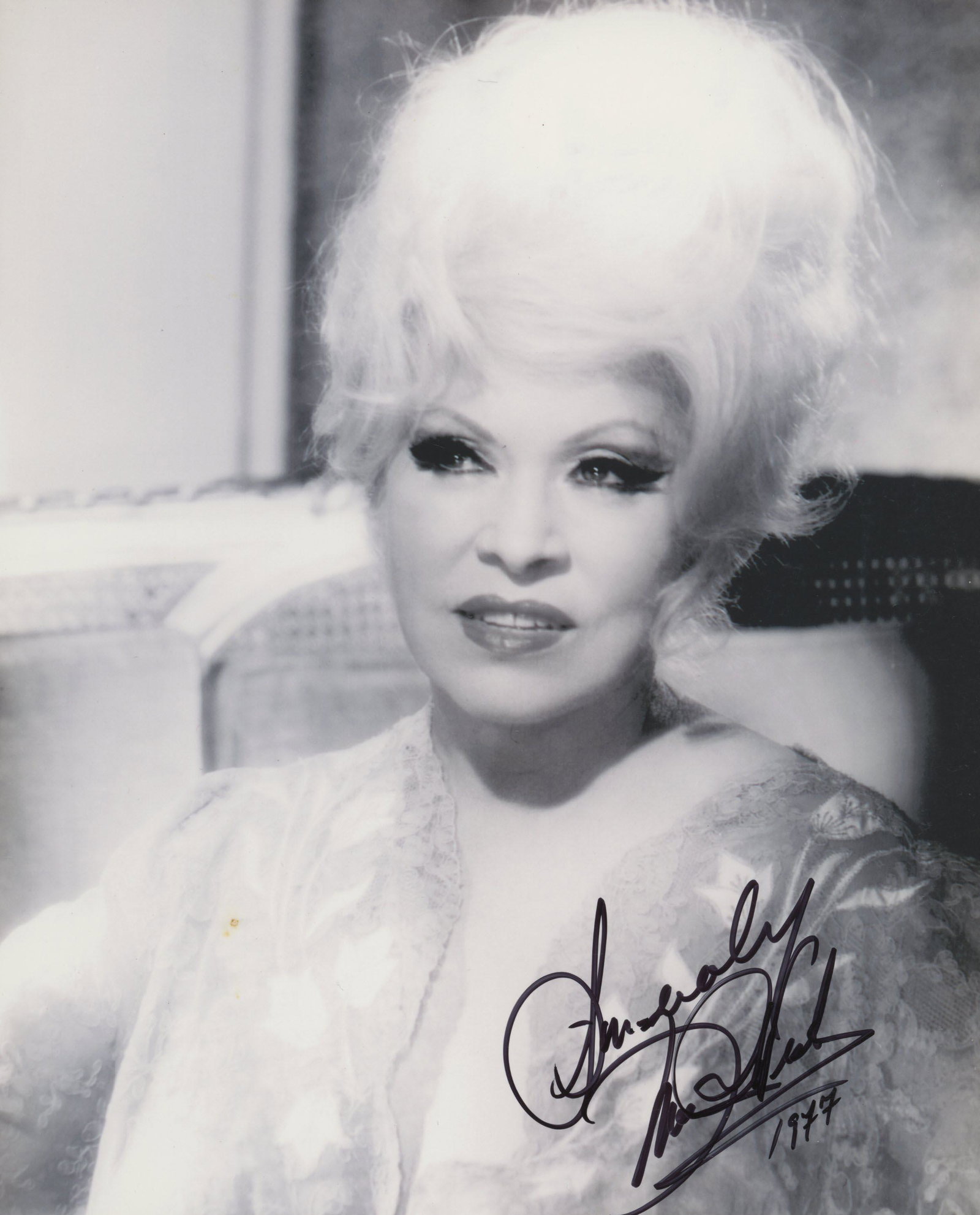 Mae West signed photo: Mae West signed 8x10 photo. Custom matted and framed, the finished piece is 11x14.