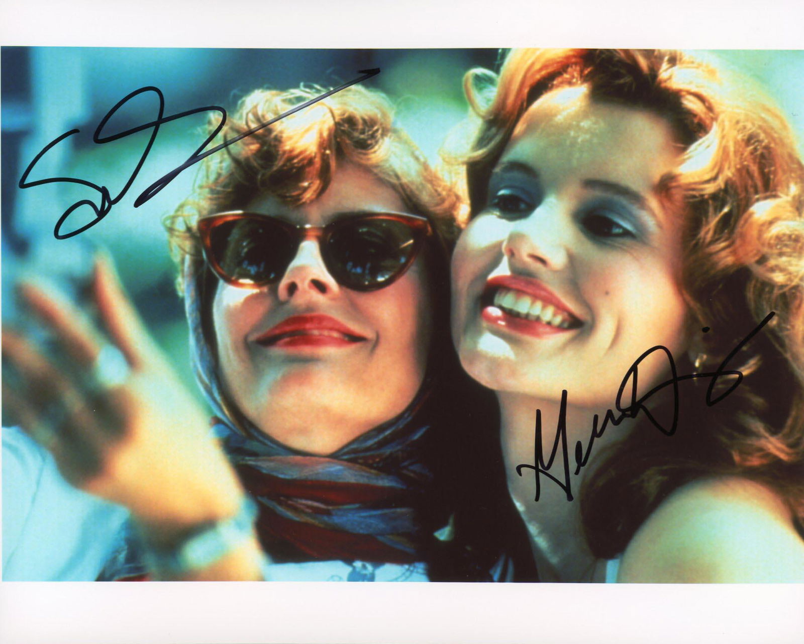 Thelma & Louise Susan Sarandon and Geena Davis signed: Thelma & Louise signed photo autographed by Susan Sarandon and Geena Davis. 8x10 inches