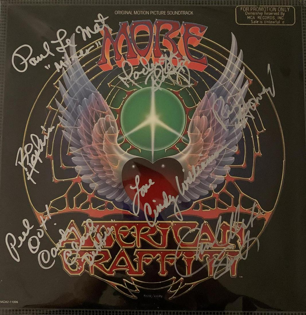 More American Graffiti cast signed sound track: More American Graffiti cast signed sound track autographed by Cindy Williams, Candy Clark, Mackenzie Phillips, Paul Le Mat, Bo Hopkins, Ron Howard, Charles Martin Smith and George Lucas. 12x12 inches.