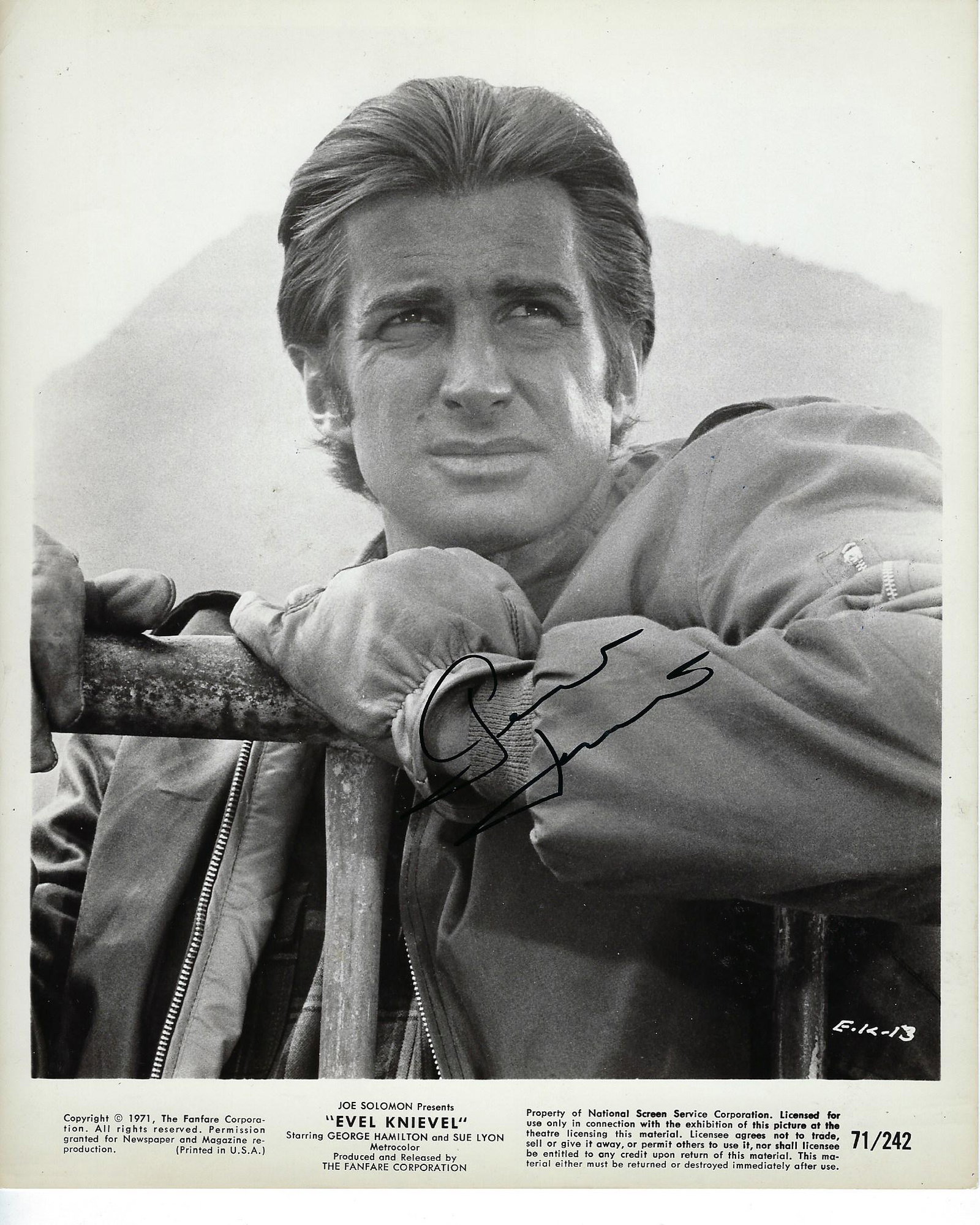 Evel Knievel George Hamilton signed movie photo: Evel Knievel signed movie photo autographed by George Hamilton. 8x10 inches