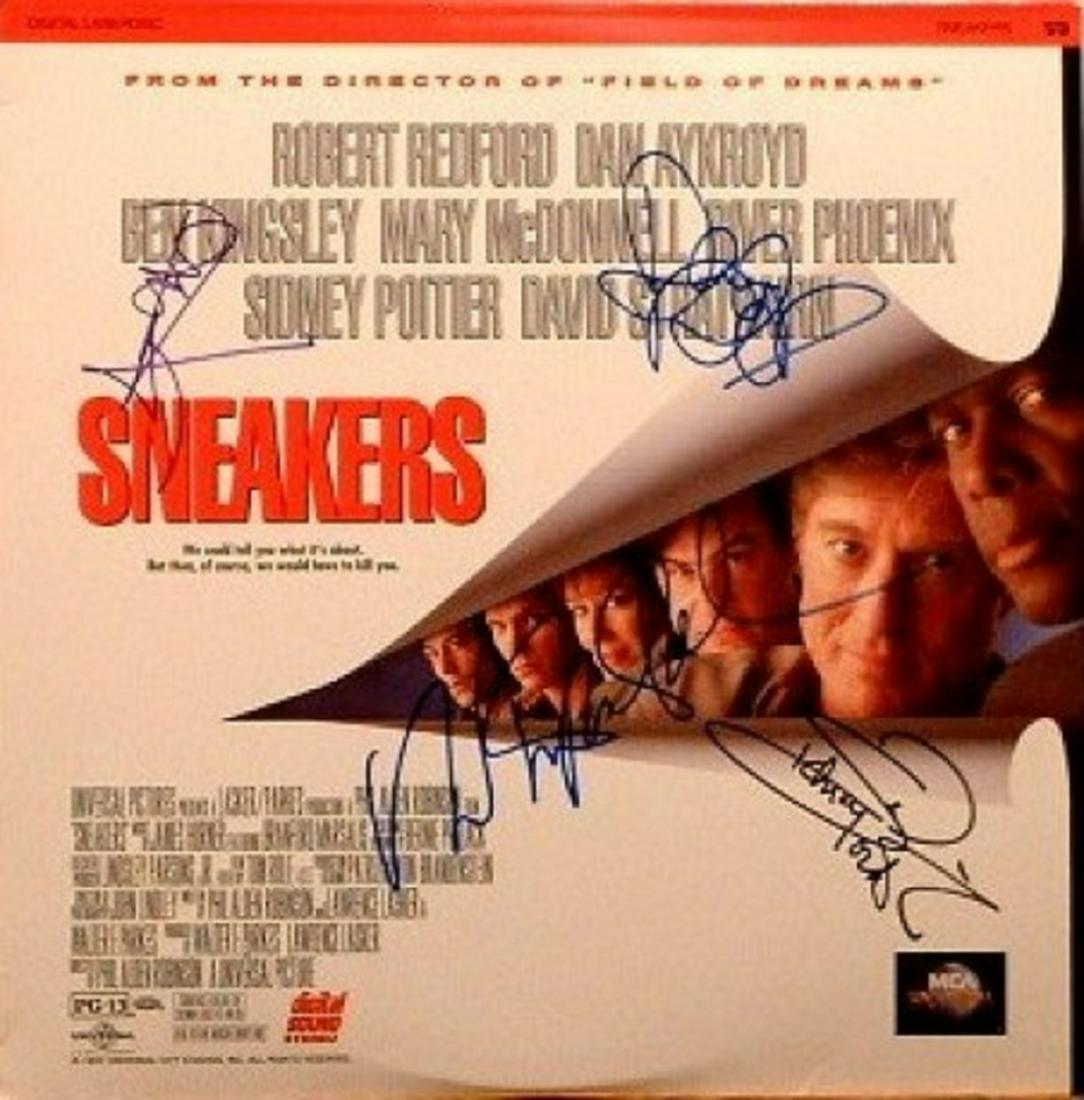 Sneakers signed LaserDisc: Sneakers Laser Disc autographed by Dan Aykroyd, Sidney Poitier, River Phoenix, and Robert Redford.