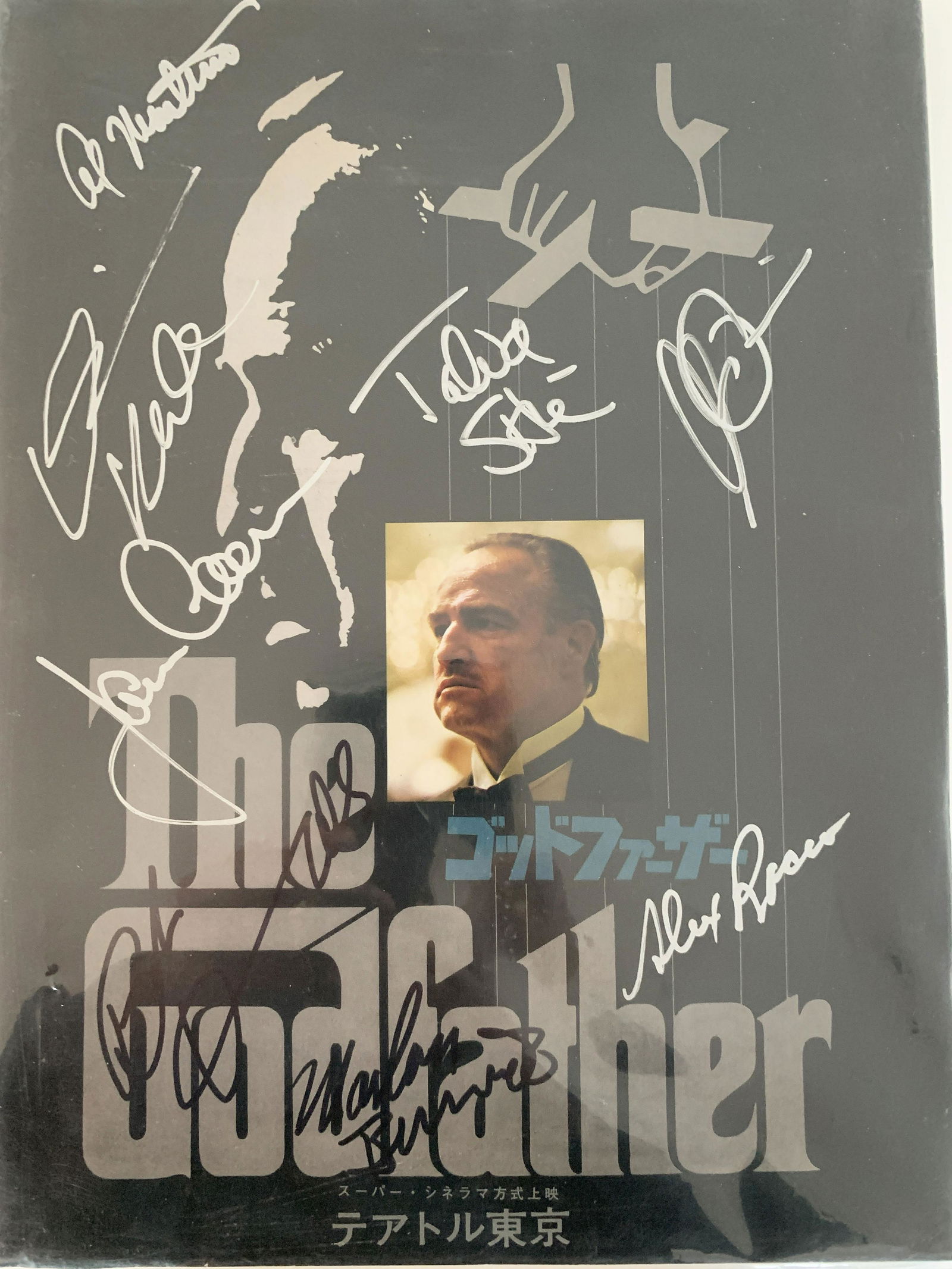 The Godfather cast signed Japanese movie program: The Godfather cast signed Japanese movie program autographed by Marlon Brando, James Caan, Talia Shire, Diane Keaton, Al Pacino, Alex Rocco, Robert Duvall and Al Martino. 9x12 inches