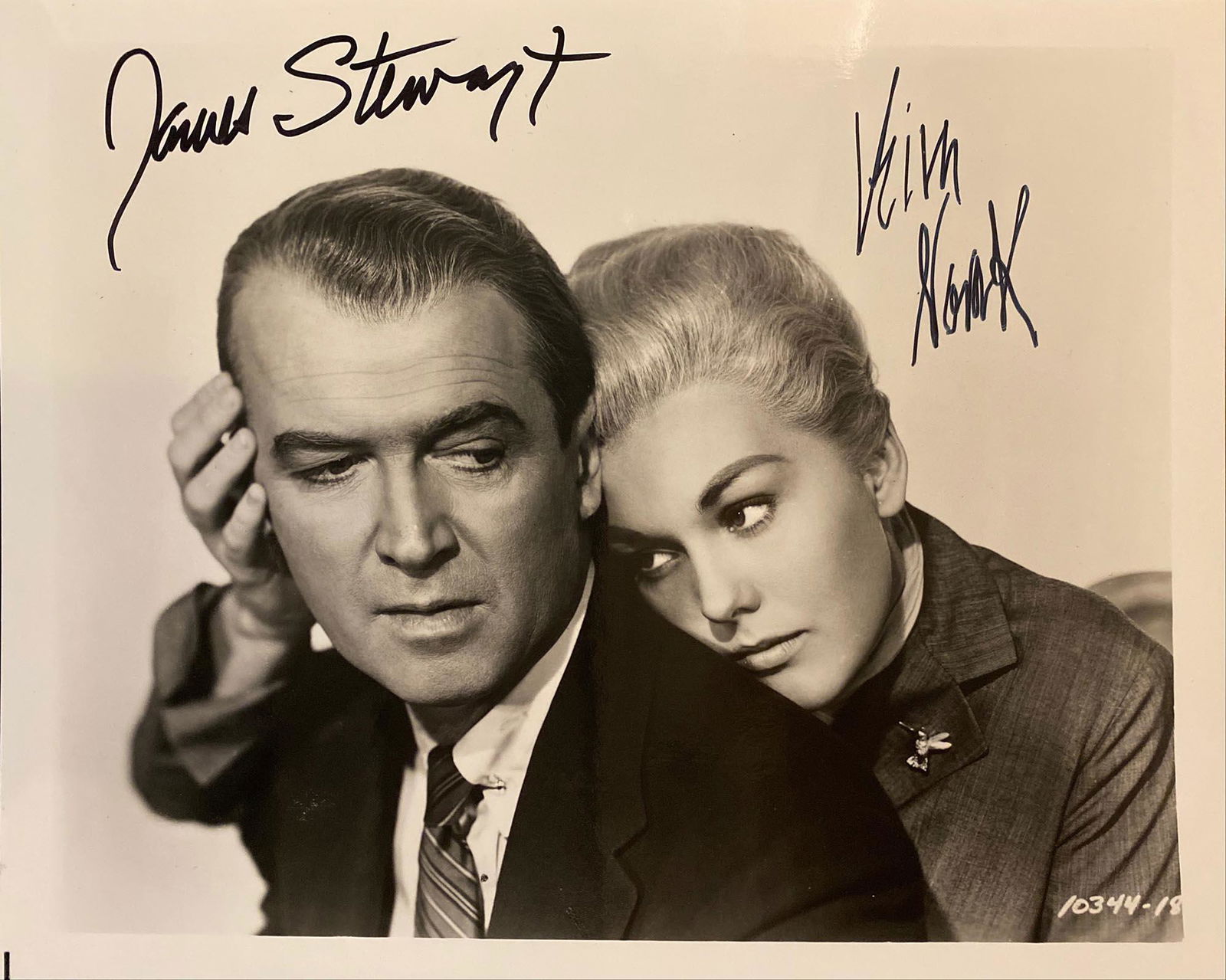 Vertigo James Stewart and Kim Novak signed movie photo: Vertigo James Stewart and Kim Novak signed black and white movie photo. 8X10 Inches