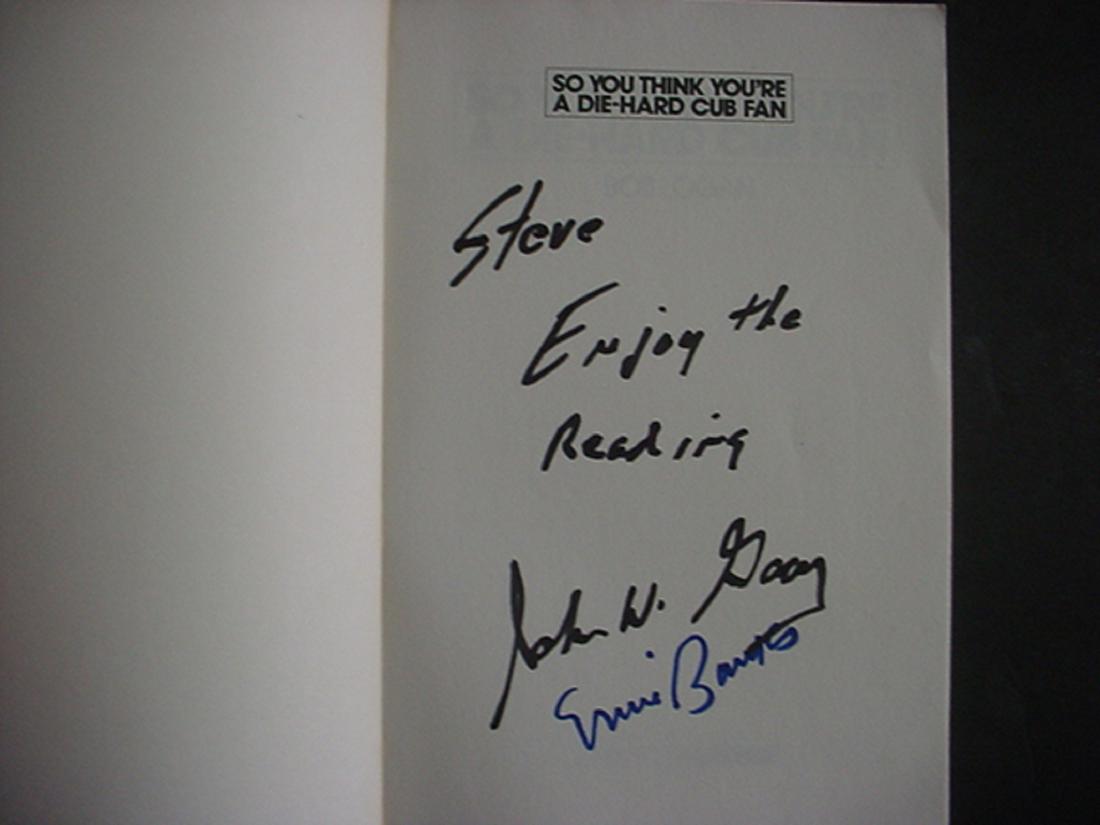 Ernie Banks and John Wayne Gacy signed book: So You Think You're A Die-Hard Cub Fan. Contemporary Books, 1985, wrappers, 130 pages, heavily illustrated. This was Gacy's personal book which he read and kept in his cell on death row. Gacy has sent