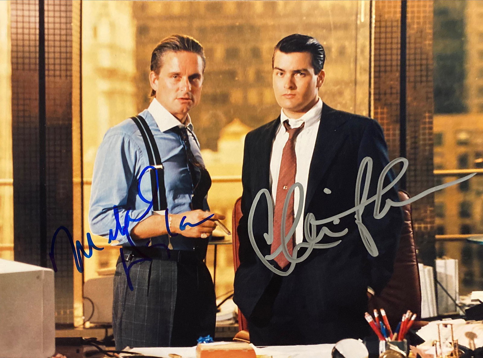 Wall Street Michael Douglas and Charlie Sheen signed: Wall Street signed movie photo autographed by Michael Douglas and Charlie Sheen. 8X10 Inches