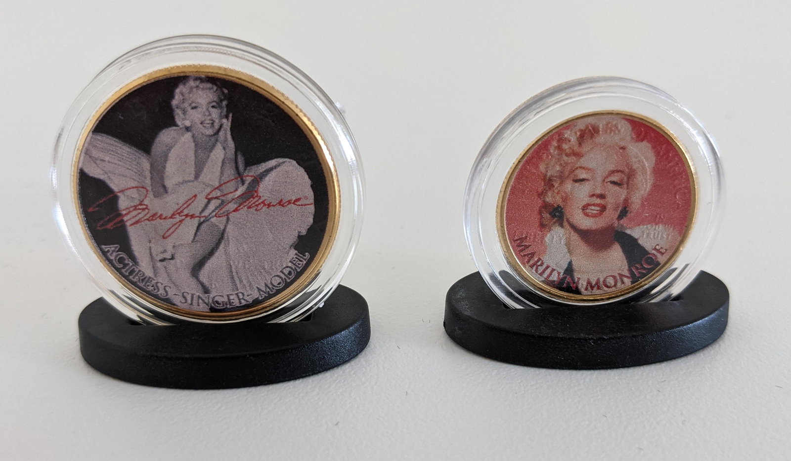 Marilyn Monroe Gold Plated Commemorative Coin Set: Marilyn Monroe Commemorative Coin Set - Set of 2 Coins. The 2-coin set includes a 24-Karat Gold Plated JFK Kennedy Half Dollar coin plus a 24-Karat Gold Plated 2005 California Statehood quarter.