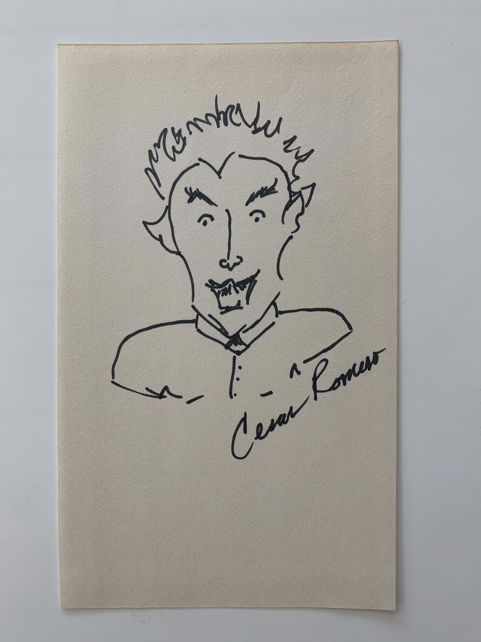 Cesar Romero hand drawn and signed Joker sketch: Cesar Romero hand drawn and signed sketch. 5x8 inches. This is a sketch of his character The Joker from the Batman television series