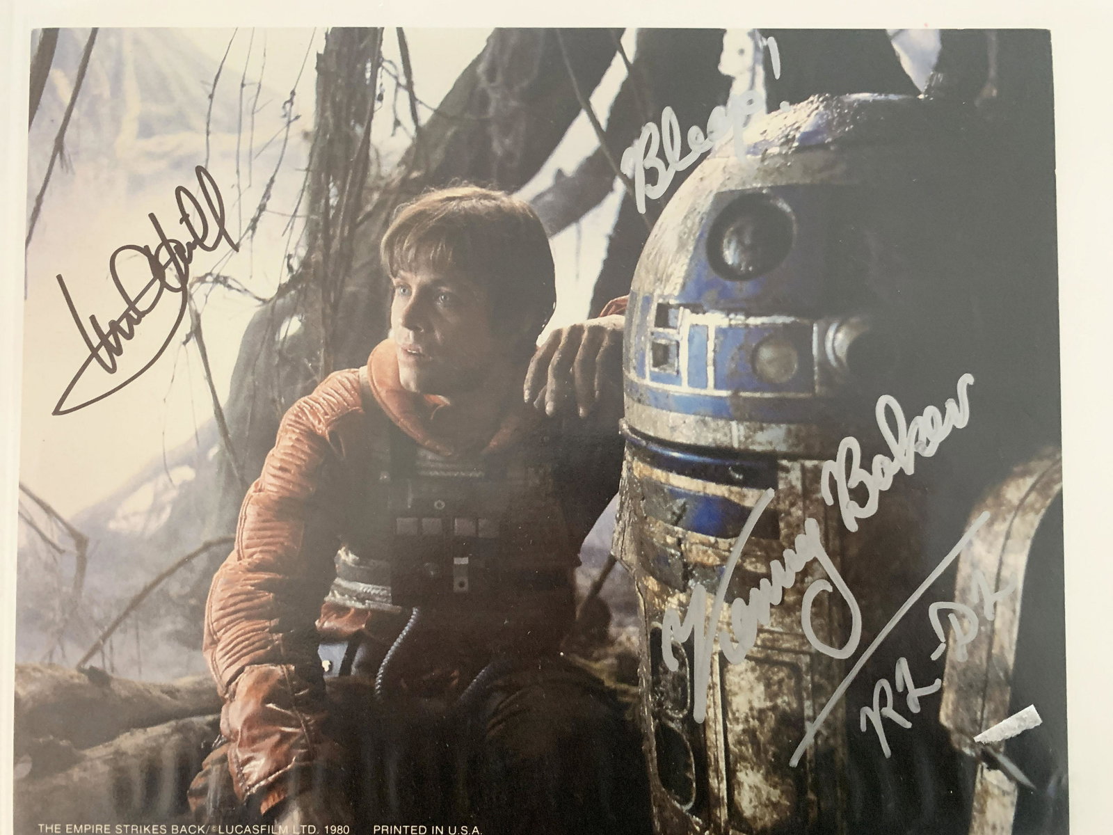 The Empire Strikes Back Mark Hamill and Kenny Baker: The Empire Strikes Back signed movie photo autographed by Mark Hamill and Kenny Baker. 8x10 inches