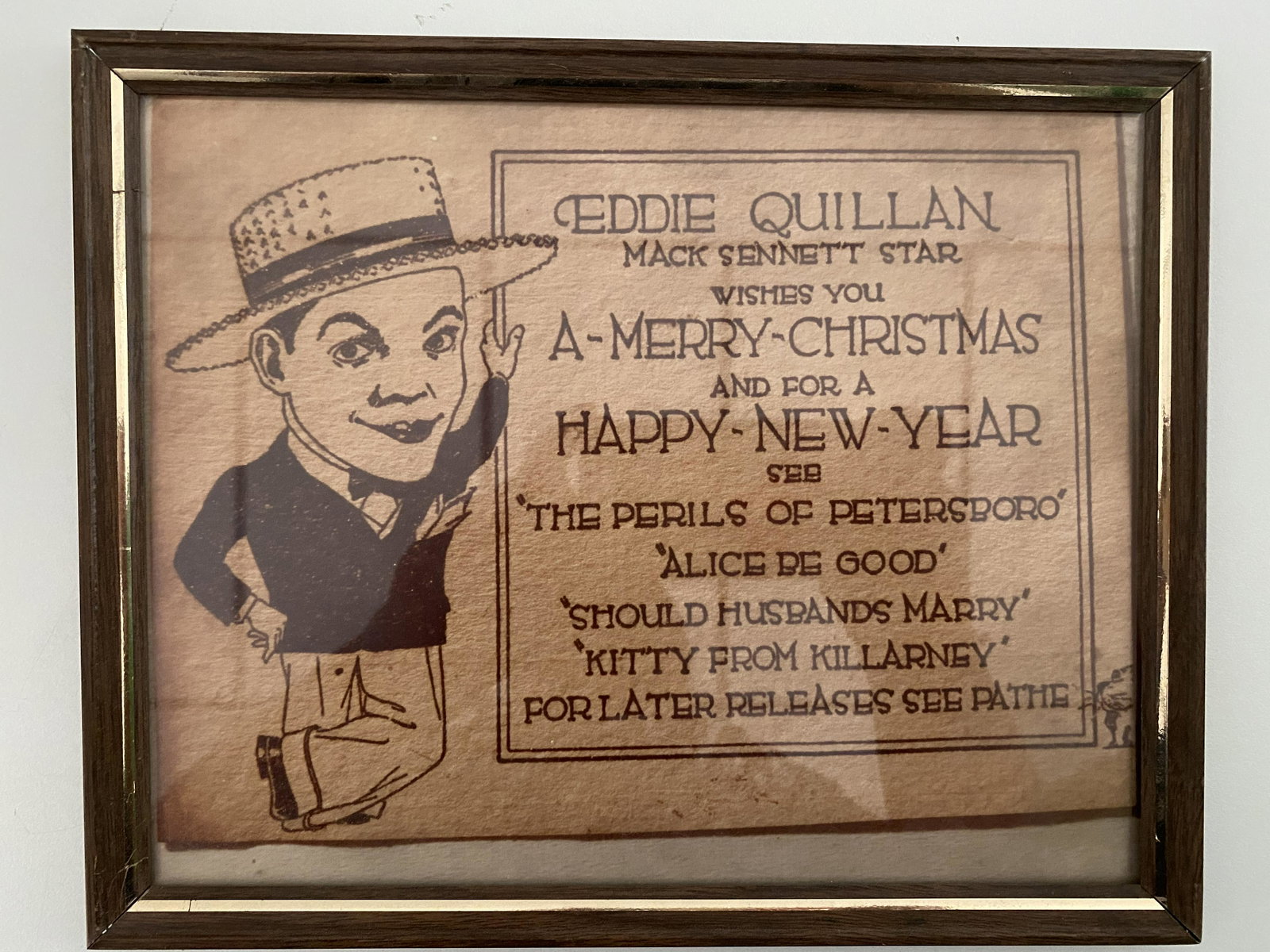 Eddie Quillan framed holiday movie advertisement: Eddie Quillan framed holiday movie advertisement 10 x 8 inches