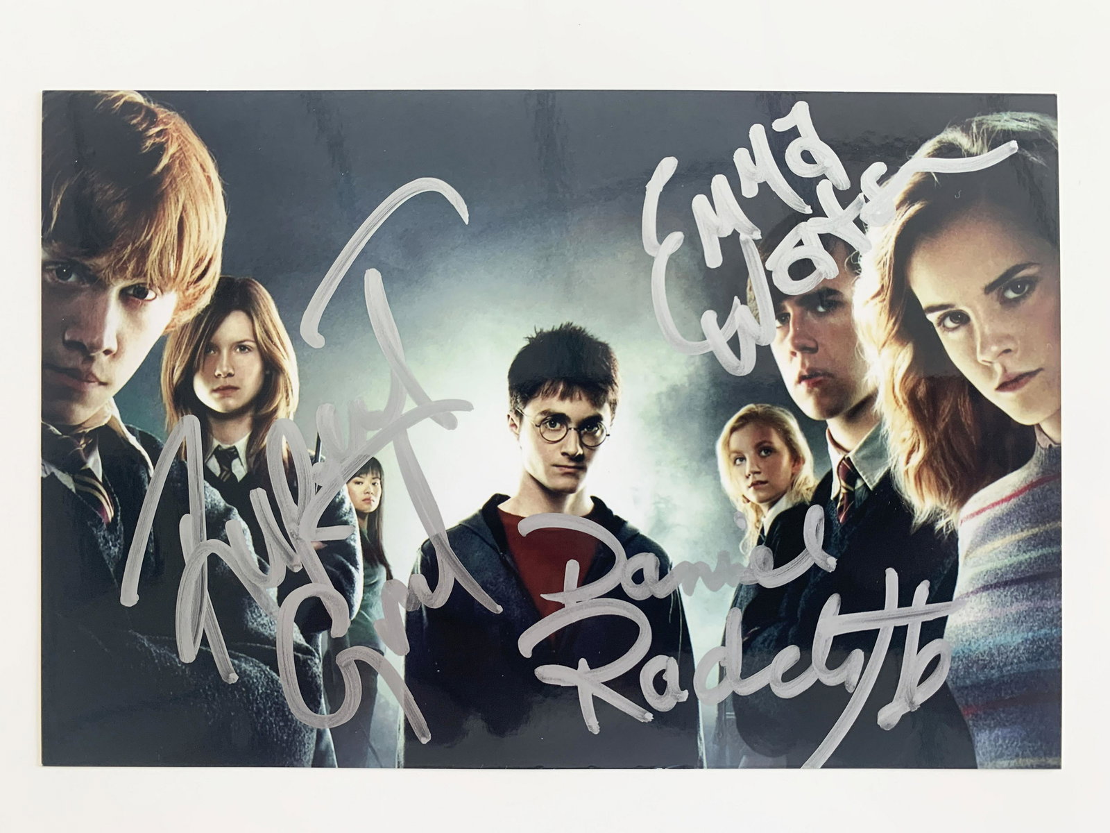 Harry Potter Cast Daniel Radcliff, Emma Watson, and: Harry Potter Cast Daniel Radcliff, Emma Watson, and Rupert Grint Signed Photo. 4x6 inches