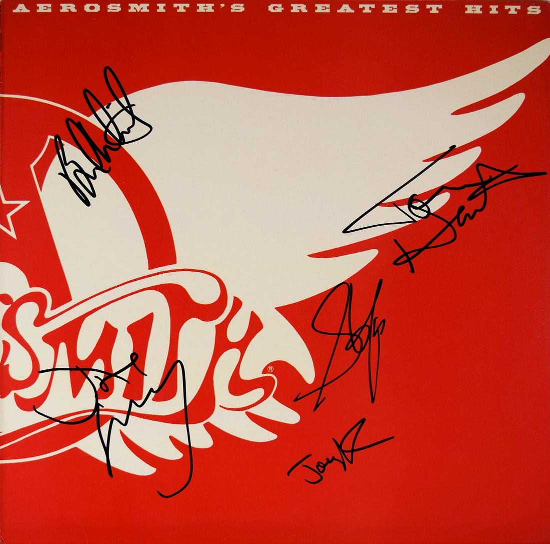 Aerosmith signed Greatest Hits album: Aerosmith 1980 Greatest Hits signed album autographed by Steven Tyler, Tom Hamilton, Joey Kramer, Brad Whitford, and Joe Perry.