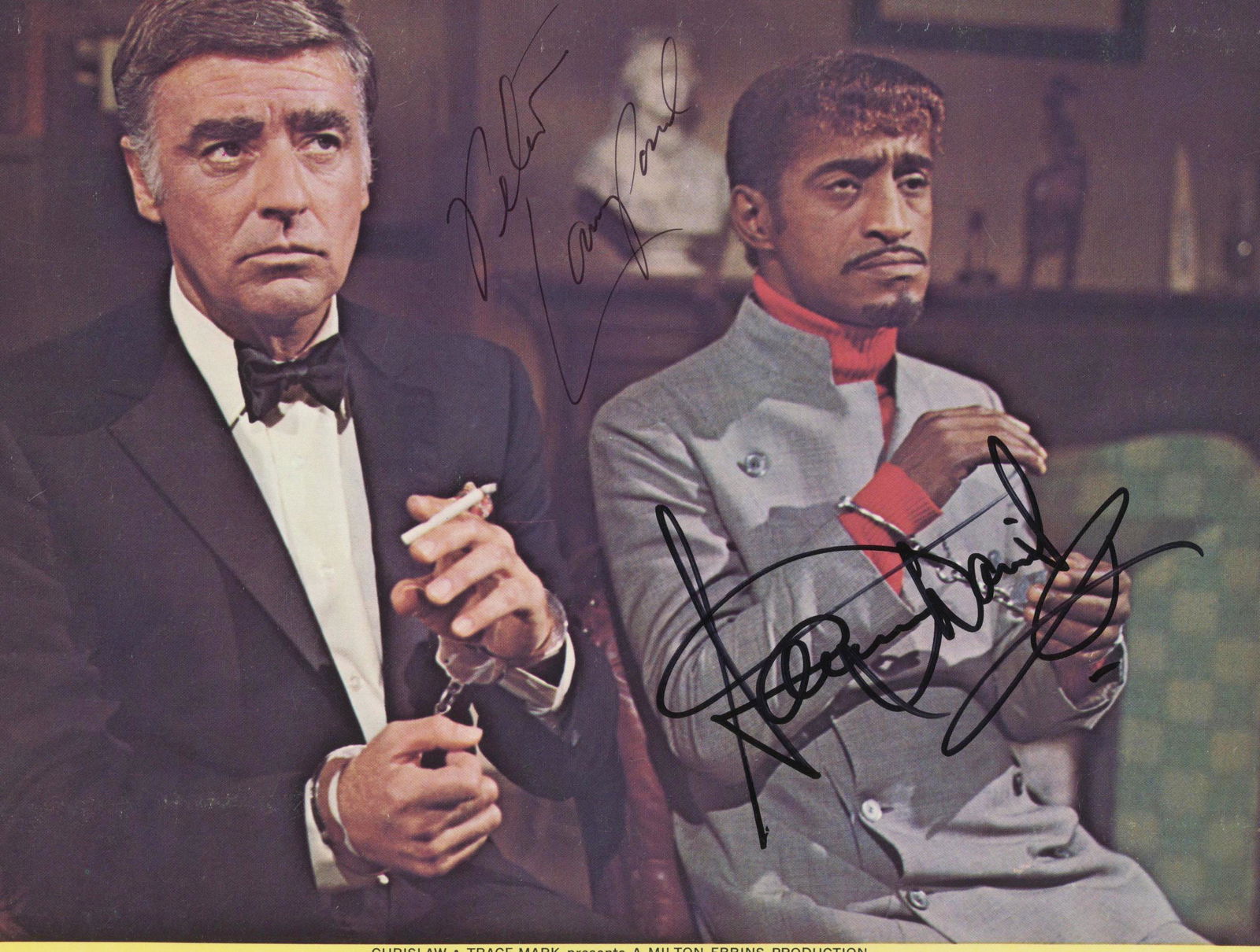 Sammy Davis Jr. and Peter Lawford signed movie photo: Salt & Pepper signed movie photo autographed by Sammy Davis Jr. and Peter Lawford. 8x10 inches