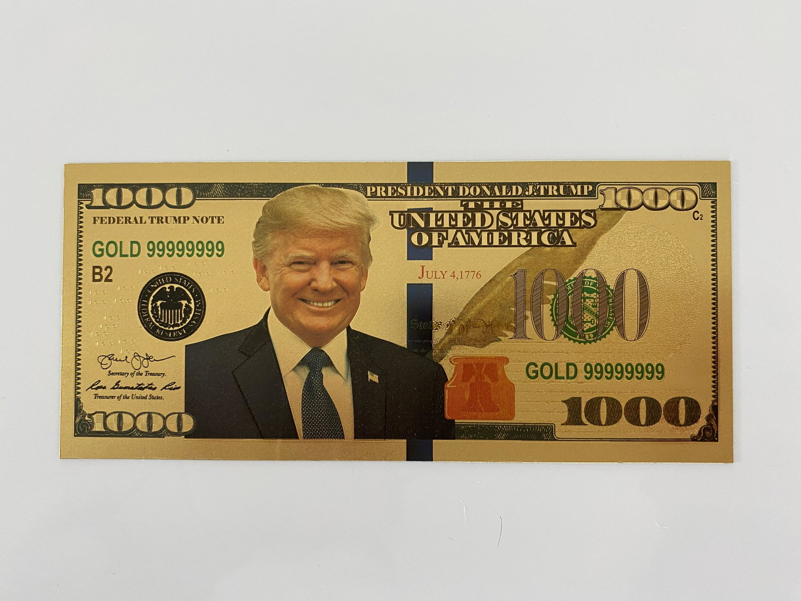 Donald Trump gold plated $1,000 bill: Donald Trump gold plated $1,000 bill