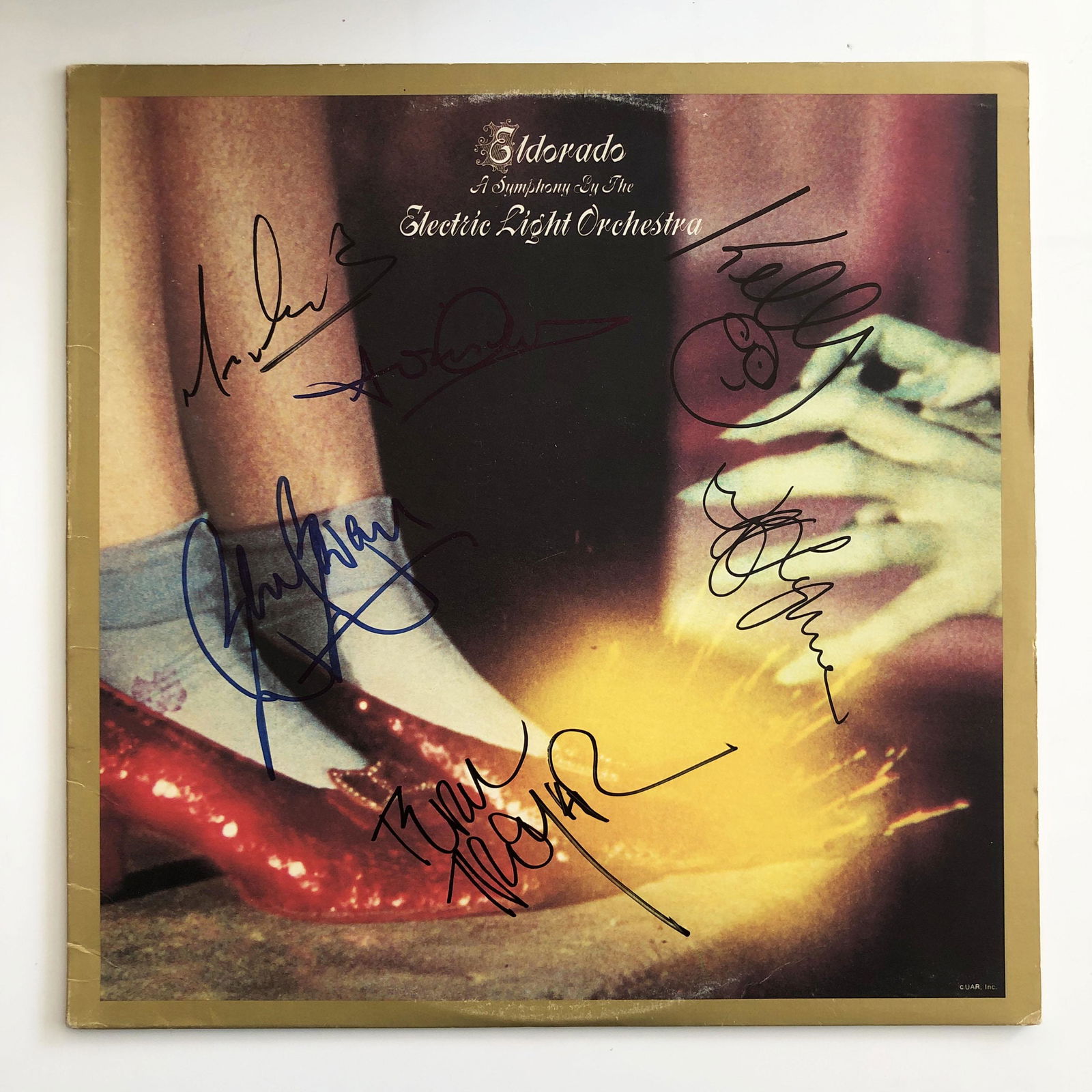 Electric Light Orchestra Eldorado signed album: Electric Light Orchestra Eldorado signed album autographed by Jeff Lynne, Bev Bevan, Kelly Groucutt, Mike de Albuquerque, Mik Kaminski and Richard Tandy. 12x12 inches. Vinyl included