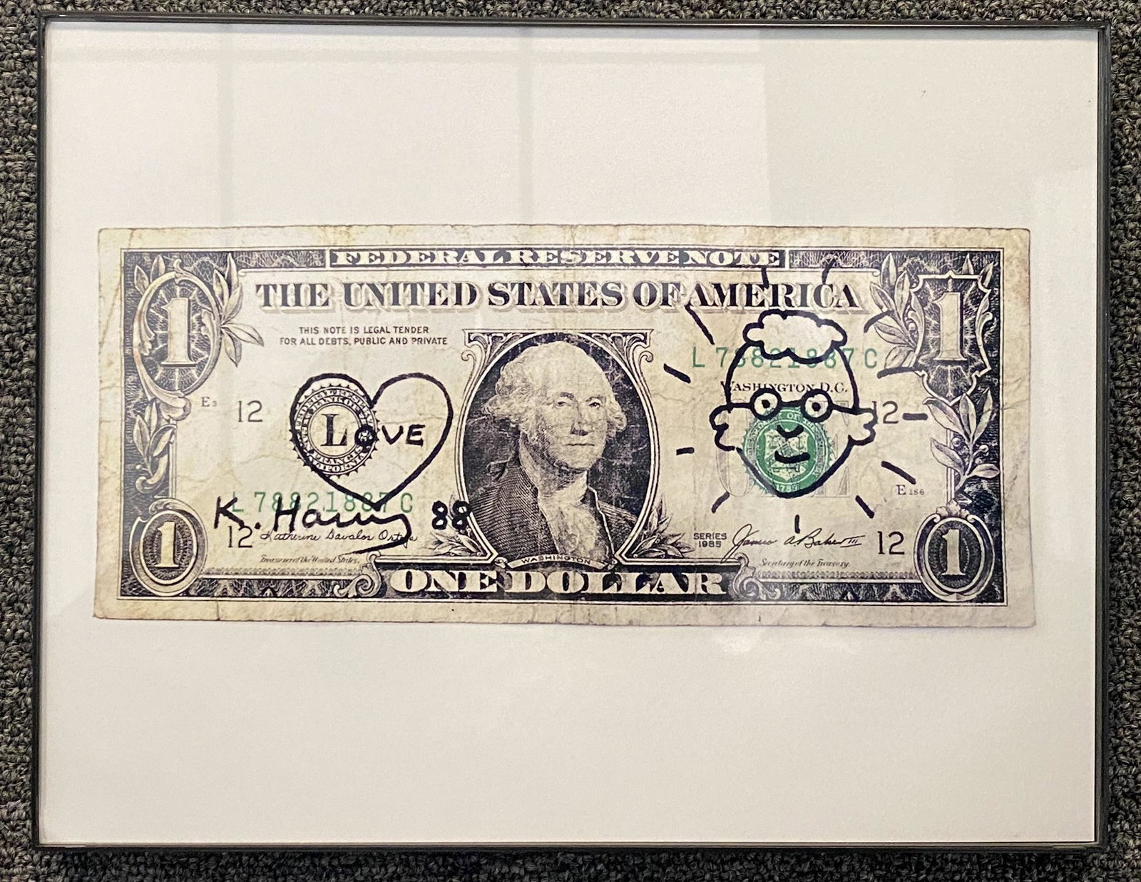 K. Haring facsimile signed framed photo: K. Haring facsimile signed photo. This is not legal tender but is art. It includes his facsimile signature and self portrait The dollar bill pictured measures 9 3/4 inches long on 8.5x11" glossy paper