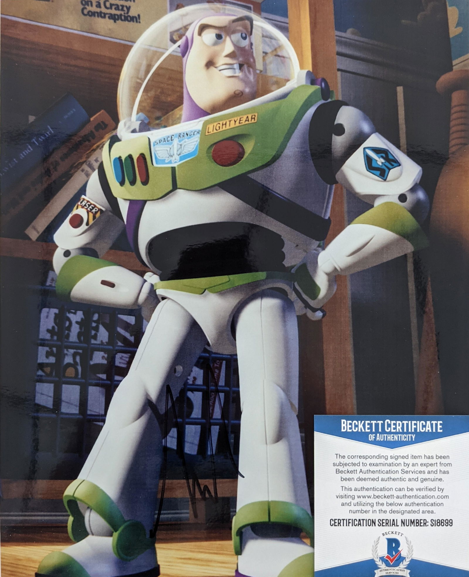 Tim Allen signed Toy Story Buzz Lightyear photo-: Tim Allen signed Toy Story Buzz Lightyear photo- BECKETT. 8x10 inches