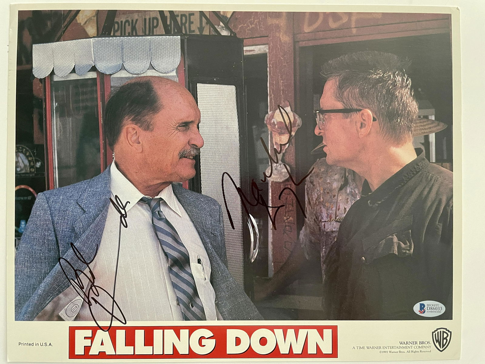 Falling Down signed promotional Photo- Beckett: Falling Down signed promotional Photo. Autographed by Michael Douglas and Robert Duvall. Beckett. 11x14inches