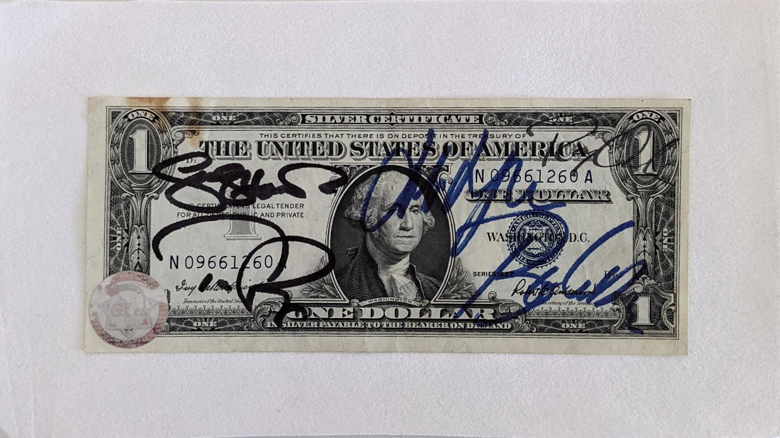 Traveling Wilburys Band Signed One Dollar Silver: Traveling Wilburys Signed One Dollar Silver Certificate Autographed by Tom Petty, Bob Dylan, Jeff Lynne, Roy Orbison and George Harrison. 8x5 inches. GFA AUTHENTICATED