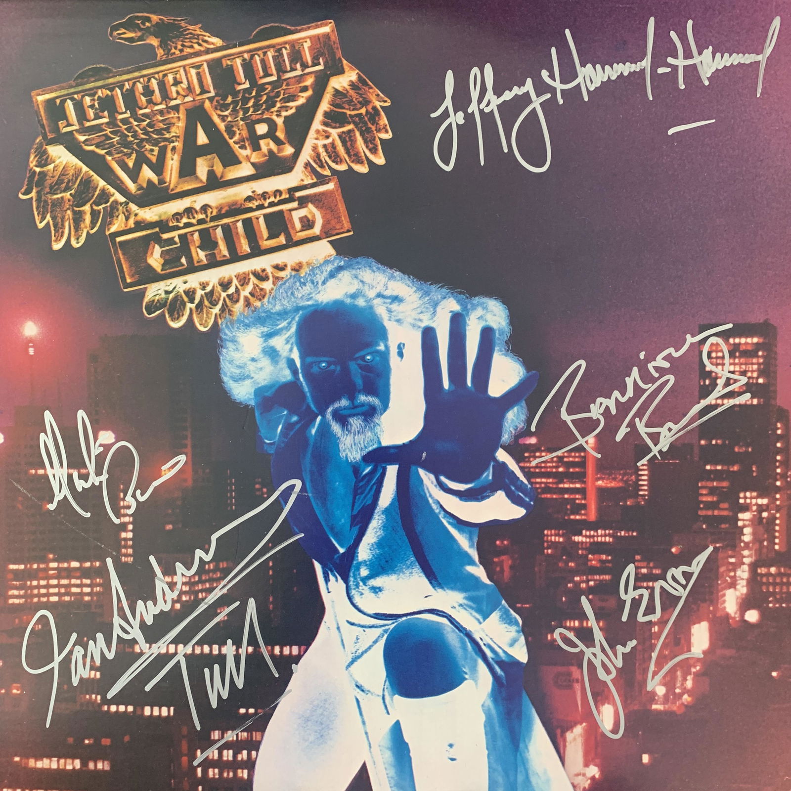 Jethro Tull War Child signed album: Jethro Tull War Child signed album autographed by Ian Anderson, Martin Barre, John Evan, Jeffrey Hammond and Barriemore Barlow. 12x12 inches, vinyl included