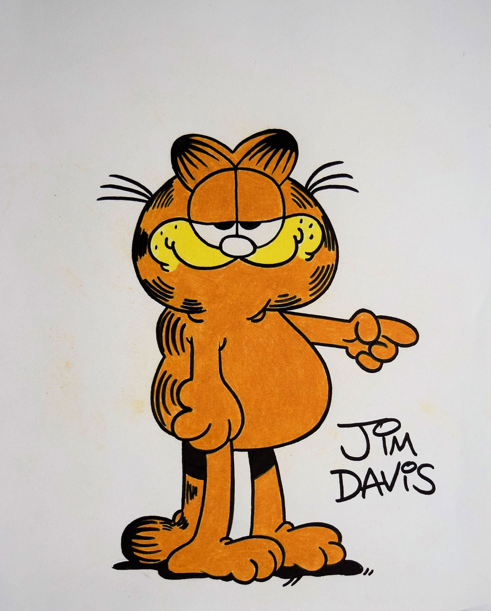 Jim Davis signed Garfield sketch: 9 1/2 in. by 12 in. Hand-drawn Garfield Sketch by Jim Davis. Signed: Jim Davis