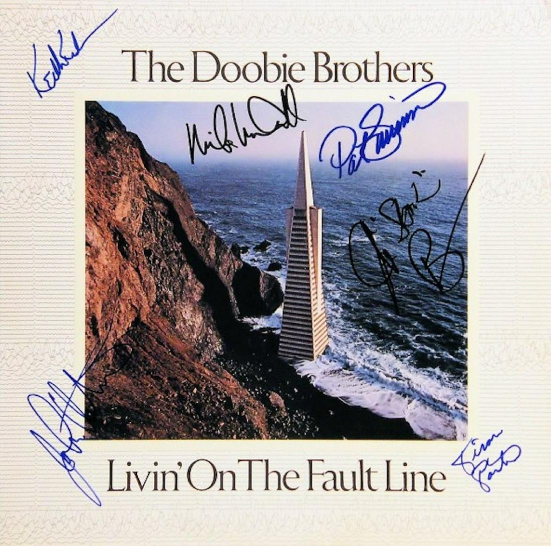 Doobie Brothers Livin' On The Fault Line signed album: Doobie Brothers Livin' On The Fault Line - 1977 signed album autographed by Patrick Simmons, Jeffrey 'Skunk' Baxter, Tiran Porter, Keith Knudsen, John Hartman and Michael McDonald
