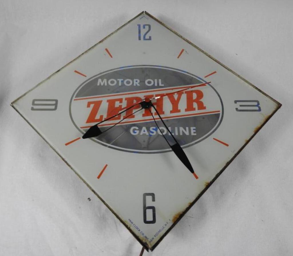 Zephyr Clock: Pam clock missing outer face, inner face has paint loss and wear, does not light but runs, size 21"x21"