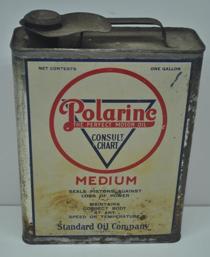 Standard Polarine Medium Gallon Oil Can: Slim one gallon can with some surface wear at lower portion of each side