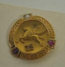 Mobil Socony Vacuum 25 Year Service Award Pin: Appears to be 10k gold with a small diamond, good condition, size .5" diameter