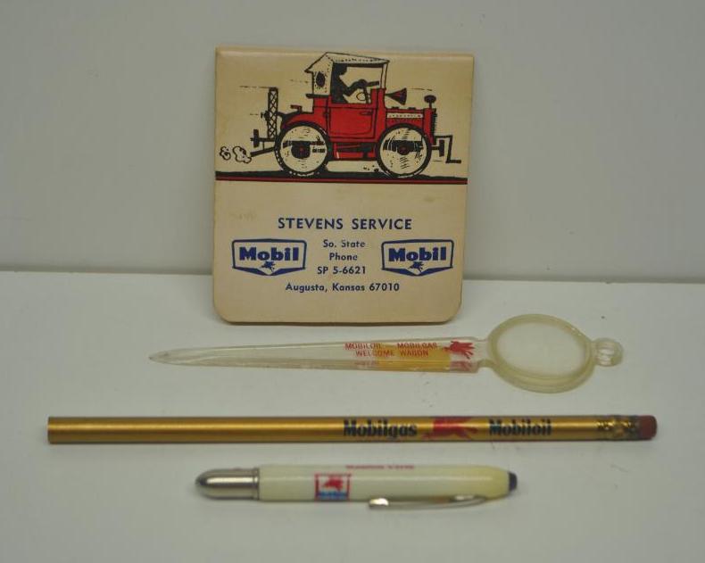 Group of Four Mobil Items: Includes pencils, notebook, and letter opener, all in fair to good condition
