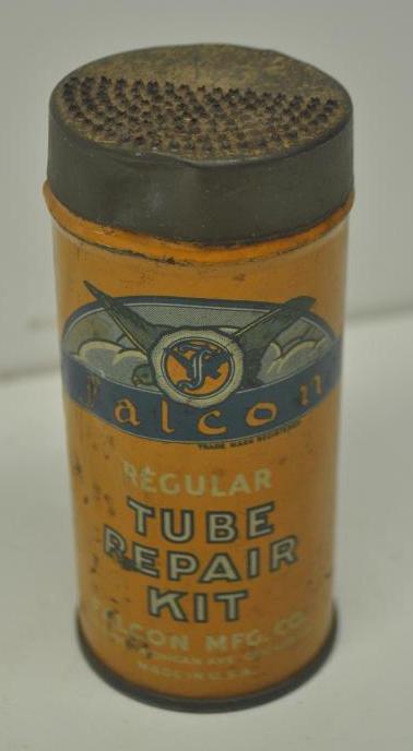 Falcon Tire Tube Repair Kit: Metal tube repair kit with minor wear and wrinkles