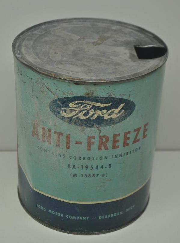 Ford Anti-Freeze Gallon Can: Empty metal gallon can with some wear throughout