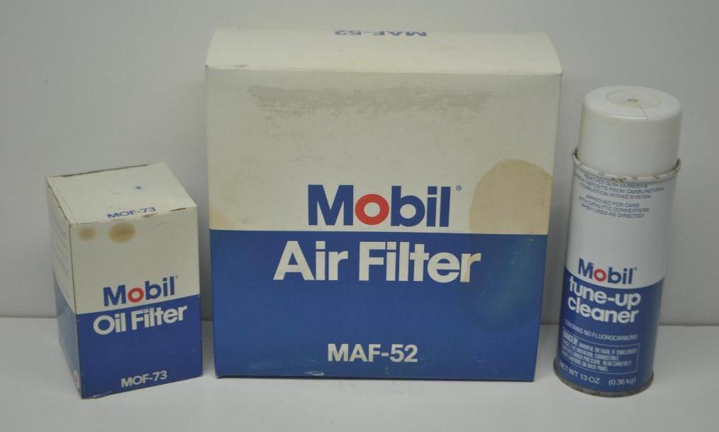 Group of Mobil Products: Two fileters and an aerosol can, all in fair to good condition, with contents