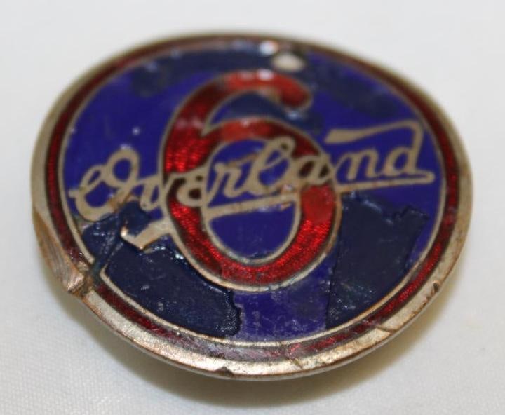 1925-1926 Willy's Overland Motor Car Co Radiator Emblem Badge: 1.5" diameter, there is an extra hole drilled through the top edge