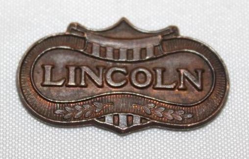 1920-1924 Lincoln Motor Car Co Instrument Panel Emblem Badge: 1" x .75"