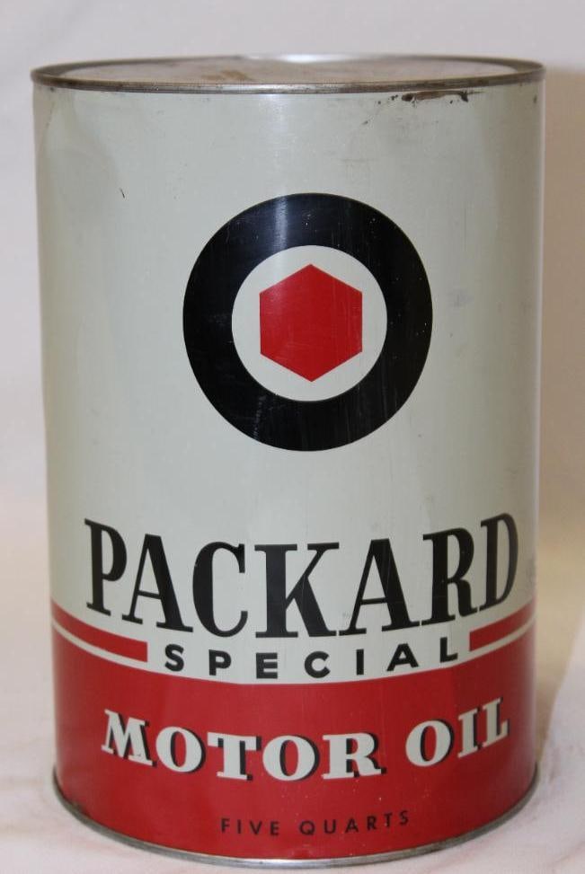 Packard Metal 5 Quart Motor Oil Can: drained by a hole in the top lid, in good condition, the reverse has several dents, 9.5" x 6.5"