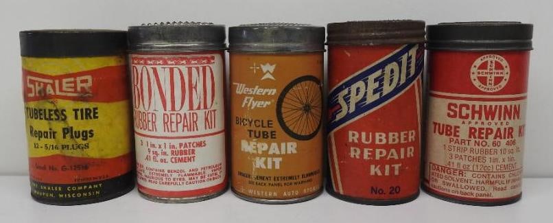 Group of Five Tire Repair Kits: Includes Schwinn, Western Flyer, and others, all cardboard and in fair to good condition, each stands 3.5"