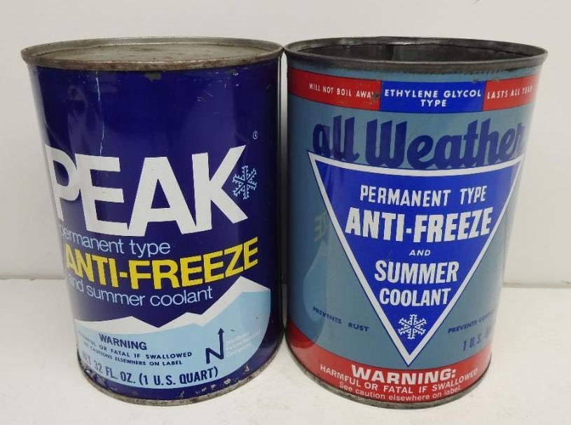Peak and All Weather Anti-Freeze Quart Cans: Empty metal quart cans, one missing top lid, both in fair to good condition