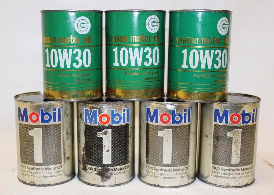 Group of 7 Metal Mobil and Gold Circle Motor Oil Cans: all are empty and in good condition