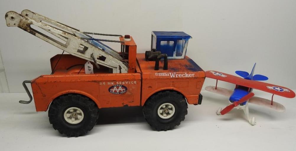 Tonka Wrecker Toy Truck and Plastic Airplane: Shows some wear from use, may or may not be missing parts, overall length of largest 16"