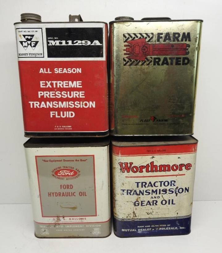 Group of Farm Two Gallon Oil Cans: Includes Ford, Massey Ferguson, Worthmore, and Farm Rated two gallon oil cans, all in fair to poor condition