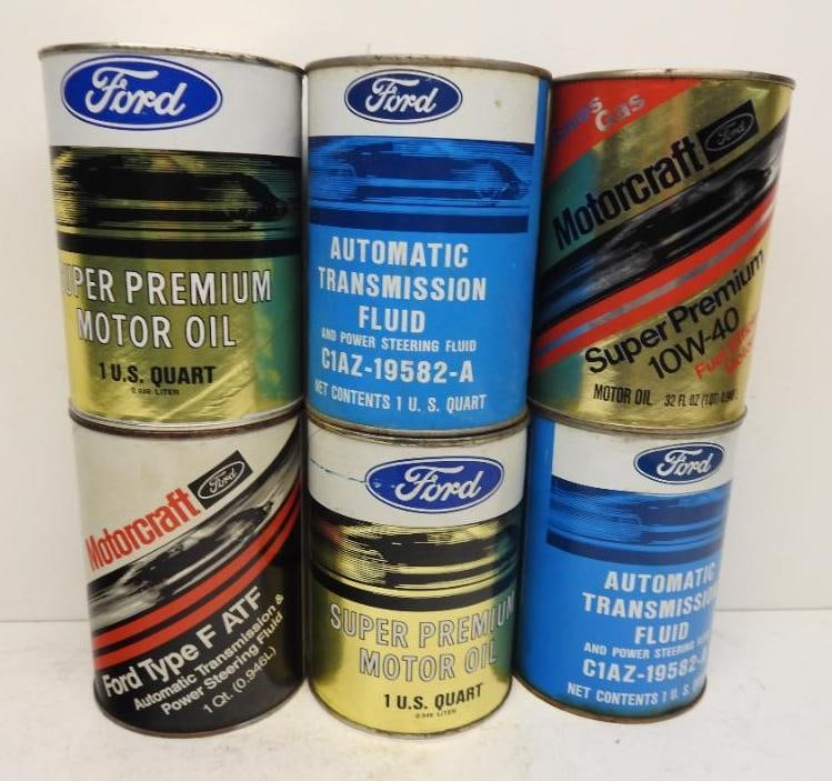 Ford Quart Oil Cans: Two metal, four composite empty quart cans in various conditions