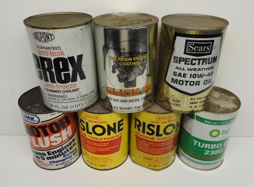 Group of Seven Assorted Quart Oil Cans: Includes BP, Dupont, Sears, and others, all metal and full, fair to good condition, WILL NOT SHIP