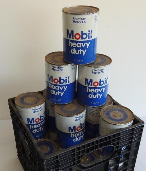 Mobil Heavy Duty Motor Oil Quart Can Crate: Eighteen full composite quart can in a milk crate, all in fair to good condition, WILL NOT SHIP