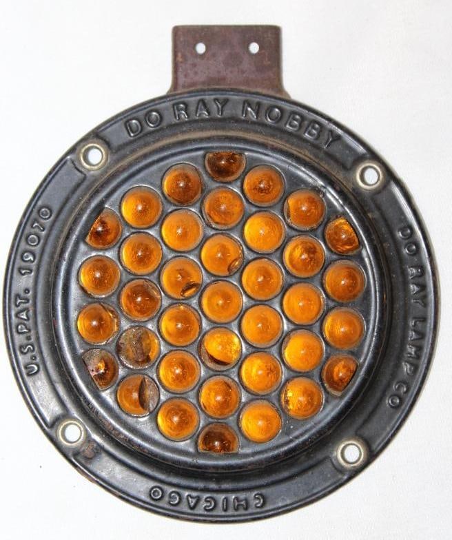 Do Ray Amber Glass Jeweled Reflector: 5" diameter, there are some chips and cracks in some of the jewels
