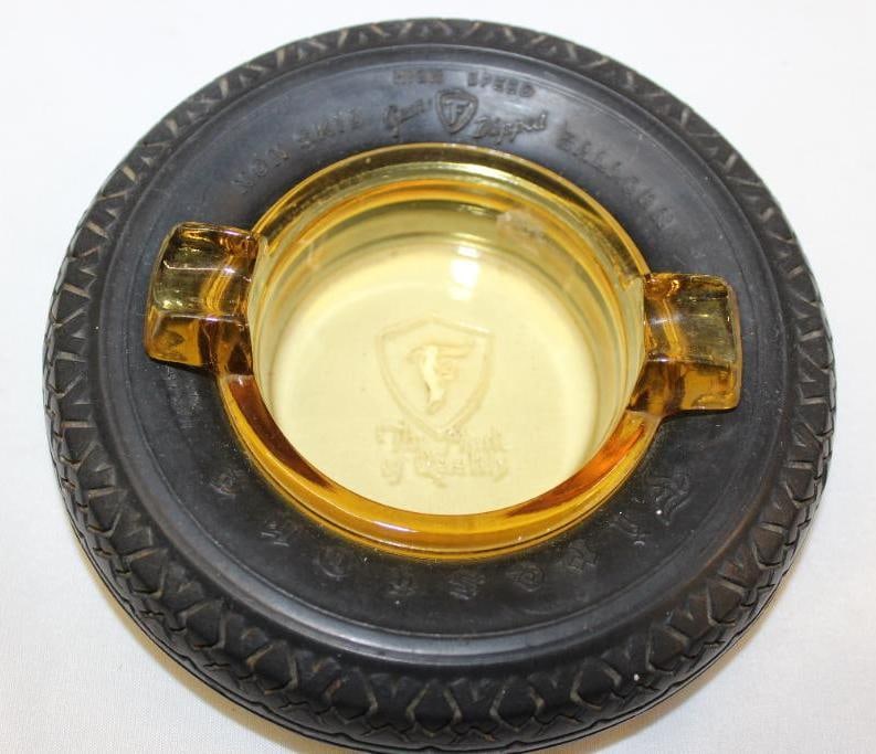 Firestone Tires the Mark of Quality Advertising Tire Ashtray: 6" diameter w/ embossed amber glass center and cigar rest