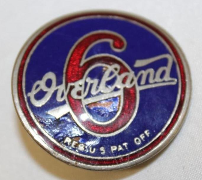 1925-1926 Overland 6 Radiator Emblem Badge: 1.75" diameter, this version is marked Reg. US. Pat. Off.